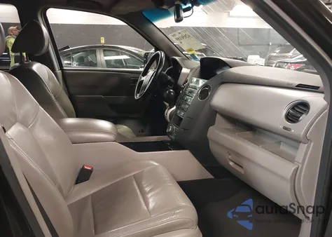 2010 Honda Pilot Touring z USA, uszkodzony, nr VIN 5FNYF4H9XAB005365